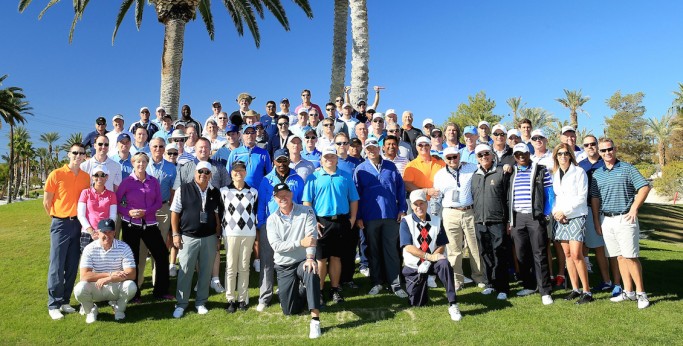 LAS VEGAS, NV - NOVEMBER 14: Ernie Els of South Africa is joined by all the players for a group picture during the 2015 Els For Autism Golf Challenge Finale at the Bali Hai Golf Club on November 14, 2015 in Las Vegas, Nevada.  (Photo by David Cannon/Getty Images)
